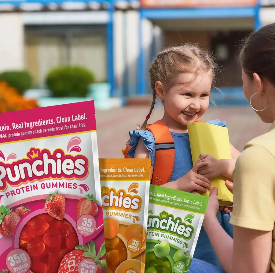 Kid friendly protein gummy: kids heading to school with Punchies protein gummies in their bags